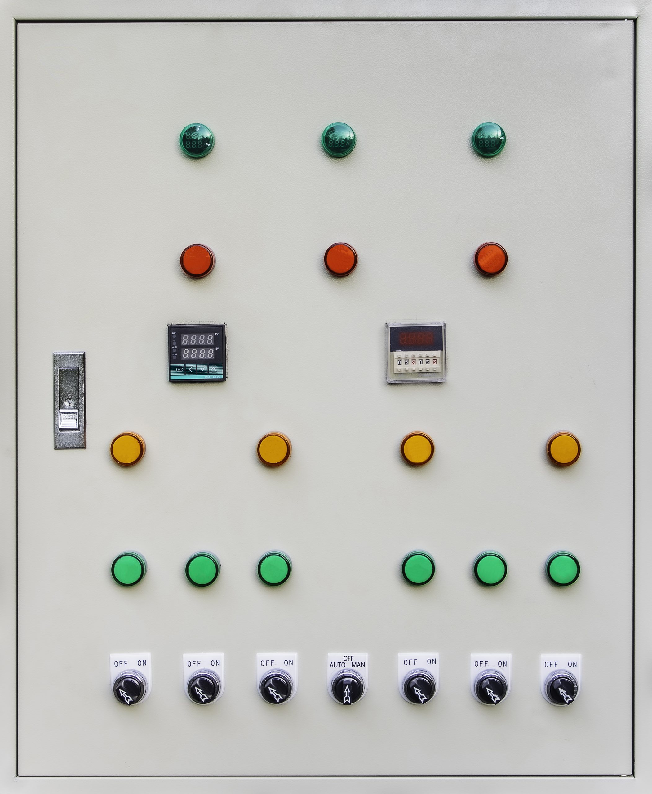 The electrical control panel displays technical information about electrical equipment